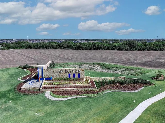 a view of a childrens park with an outdoor seating