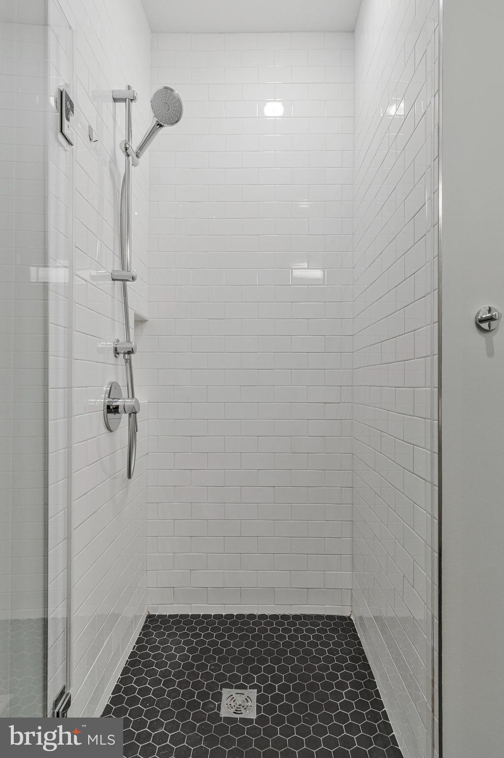 57 N Street Northwest, Unit 433 Washington, DC 20001 - Photo 18 of 58 Modern ensuite bathroom.