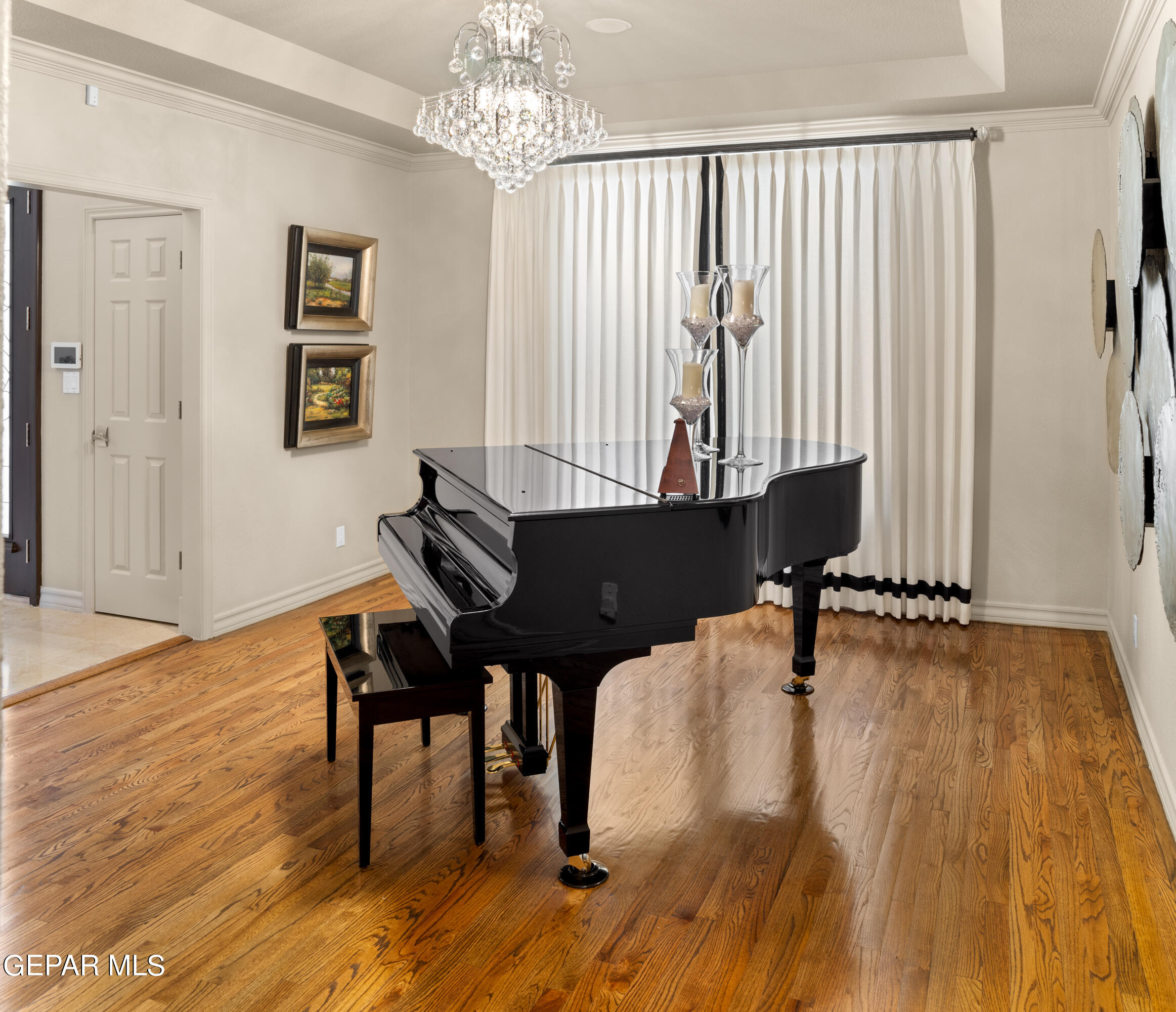 813 Rosinante Road El Paso, TX 79922 - Photo 12 of 67 a view of a dining room with furniture and wooden floor