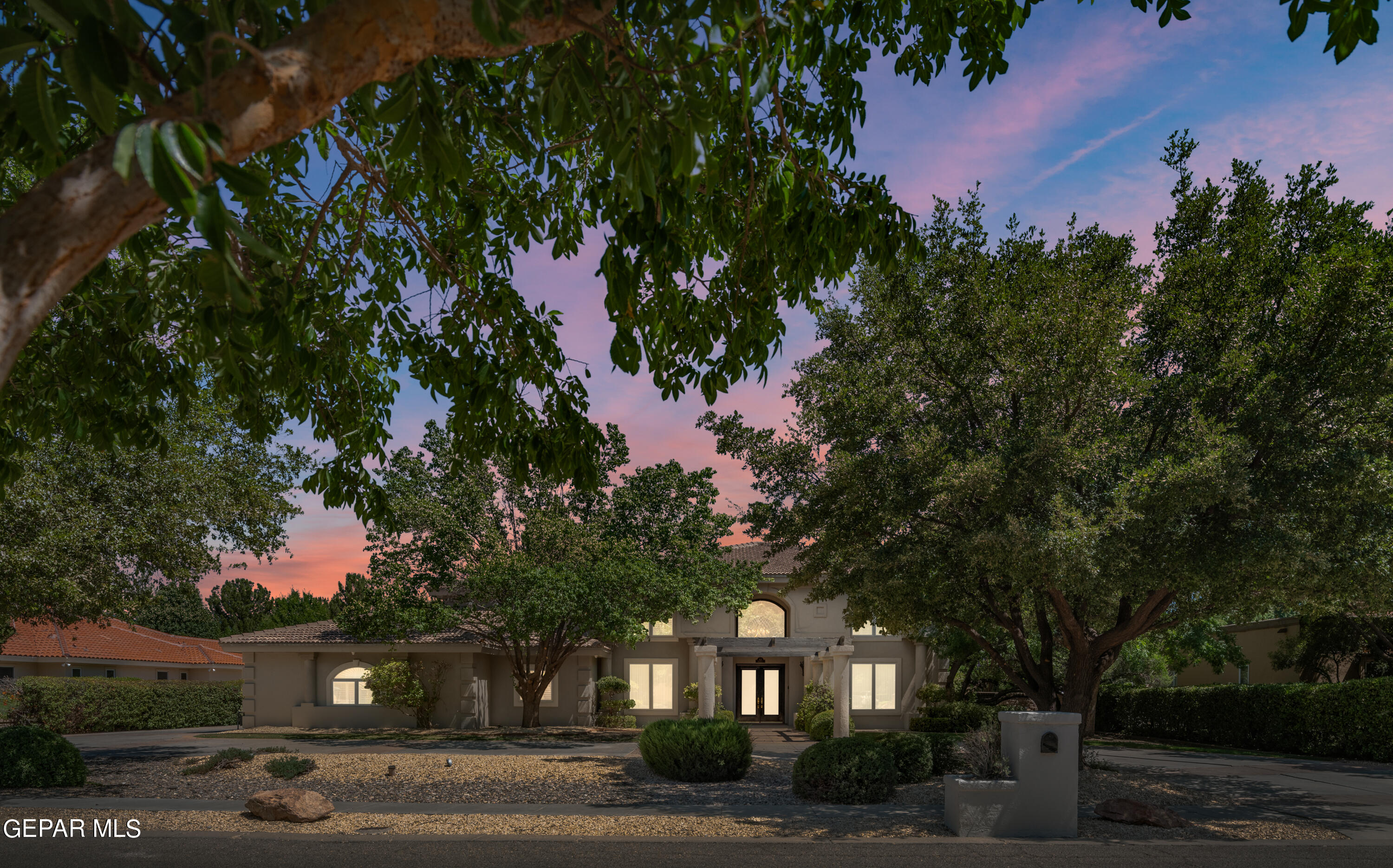 813 Rosinante Road El Paso, TX 79922 - Photo 2 of 67 a front view of a house with a yard