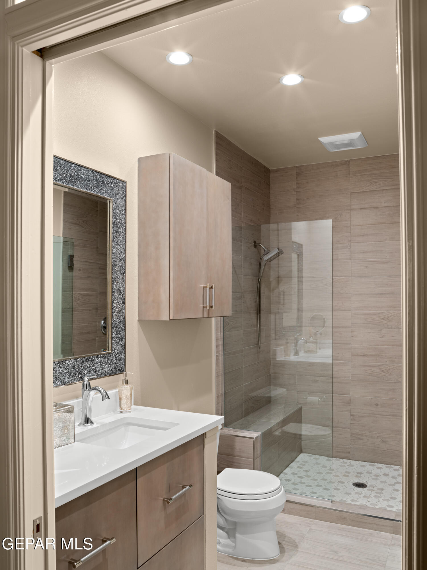 813 Rosinante Road El Paso, TX 79922 - Photo 38 of 67 a bathroom with a sink toilet and shower