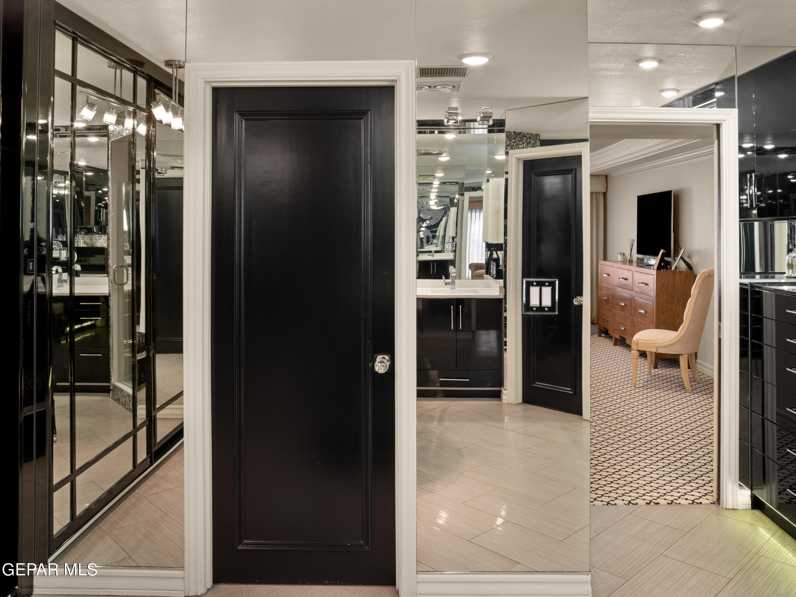 813 Rosinante Road El Paso, TX 79922 - Photo 48 of 67 a bathroom with a glass shower door