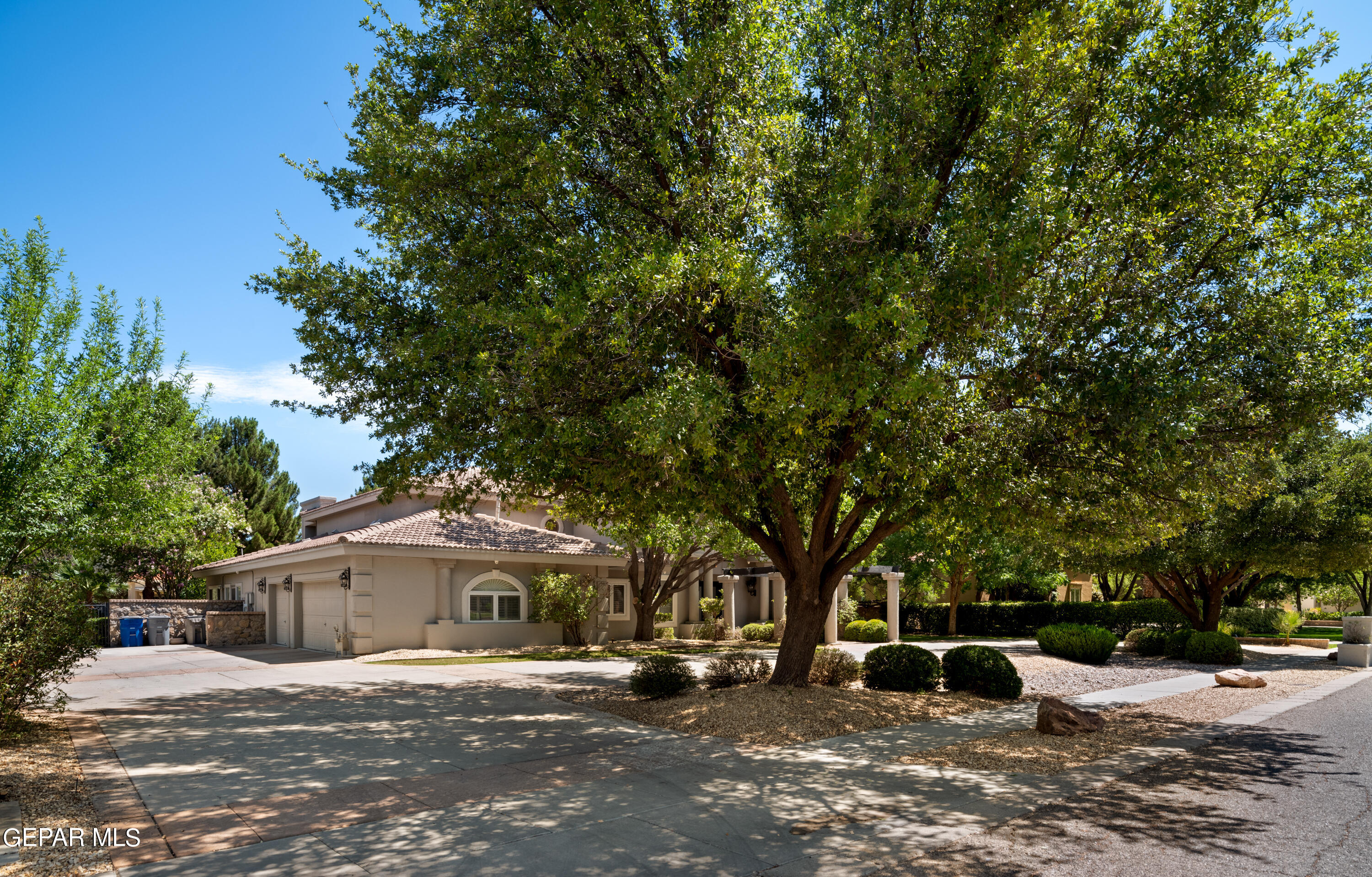 813 Rosinante Road El Paso, TX 79922 - Photo 5 of 67 a view of a house with a tree in front