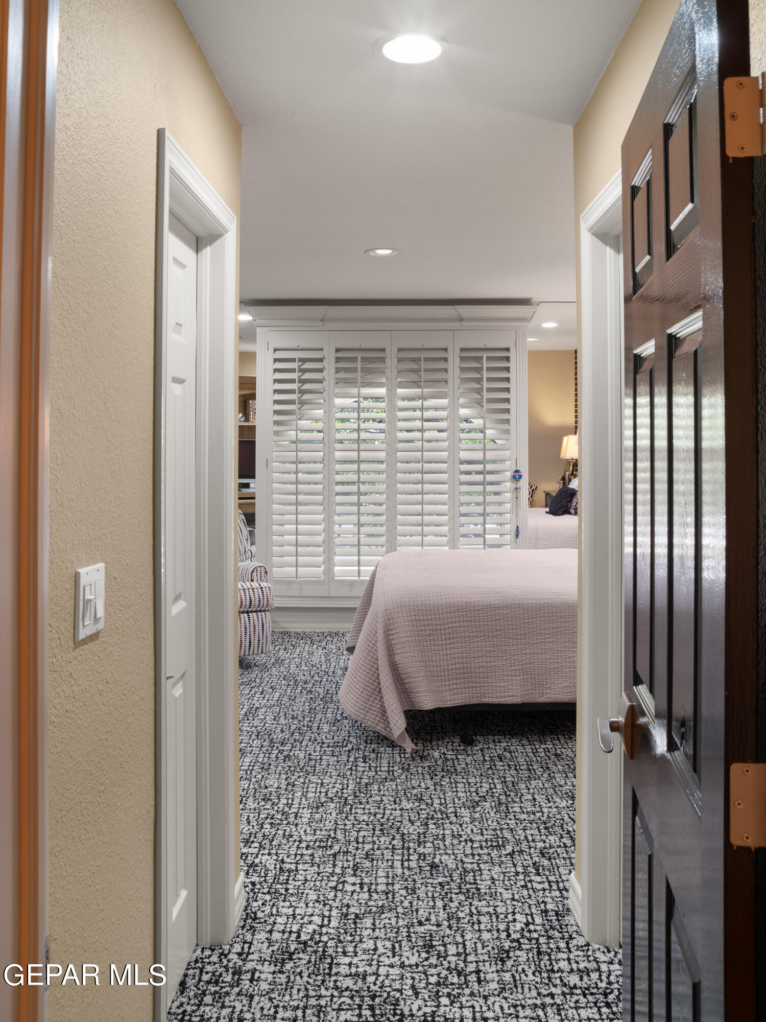 813 Rosinante Road El Paso, TX 79922 - Photo 51 of 67 a bedroom with a bed and a walk in closet