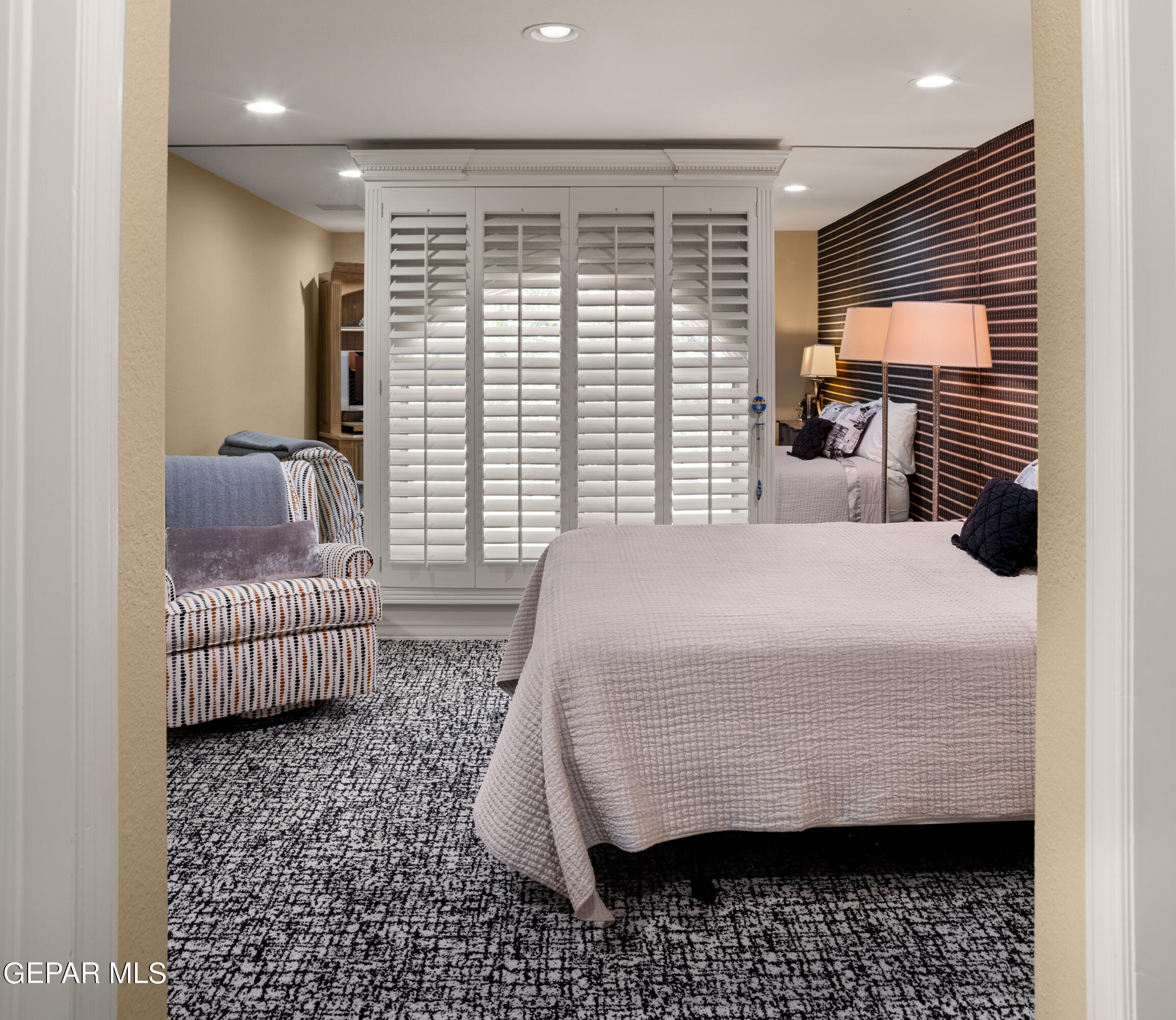 813 Rosinante Road El Paso, TX 79922 - Photo 52 of 67 a bedroom with a bed and a couch