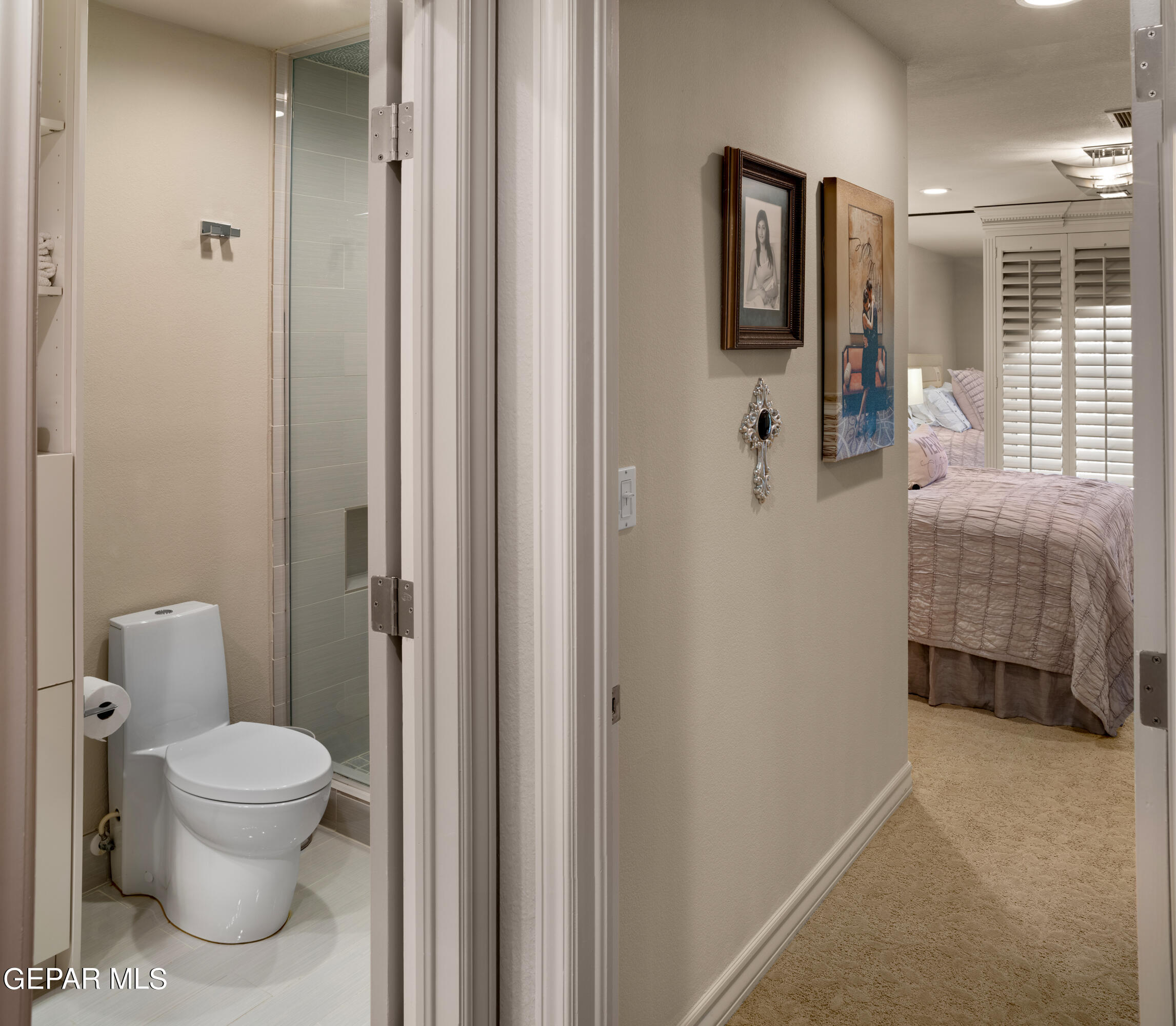 813 Rosinante Road El Paso, TX 79922 - Photo 57 of 67 a bathroom with a toilet and a shower