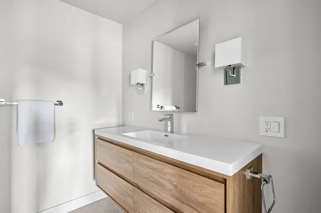 a bathroom with a shower and a toilet