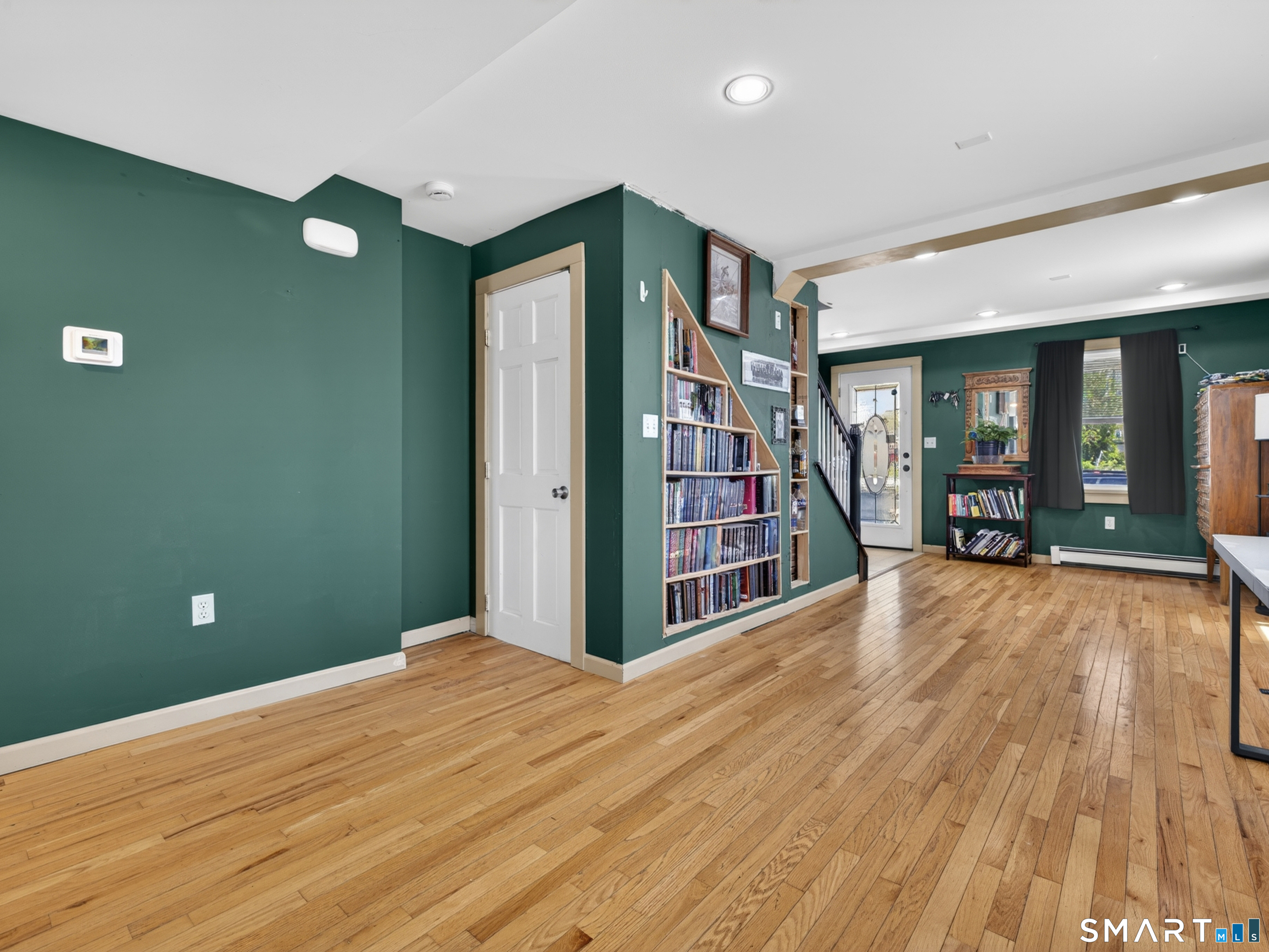 13 Oak Street Groton, CT 06340 - Photo 7 of 38 a view of livingroom with furniture and wooden floor