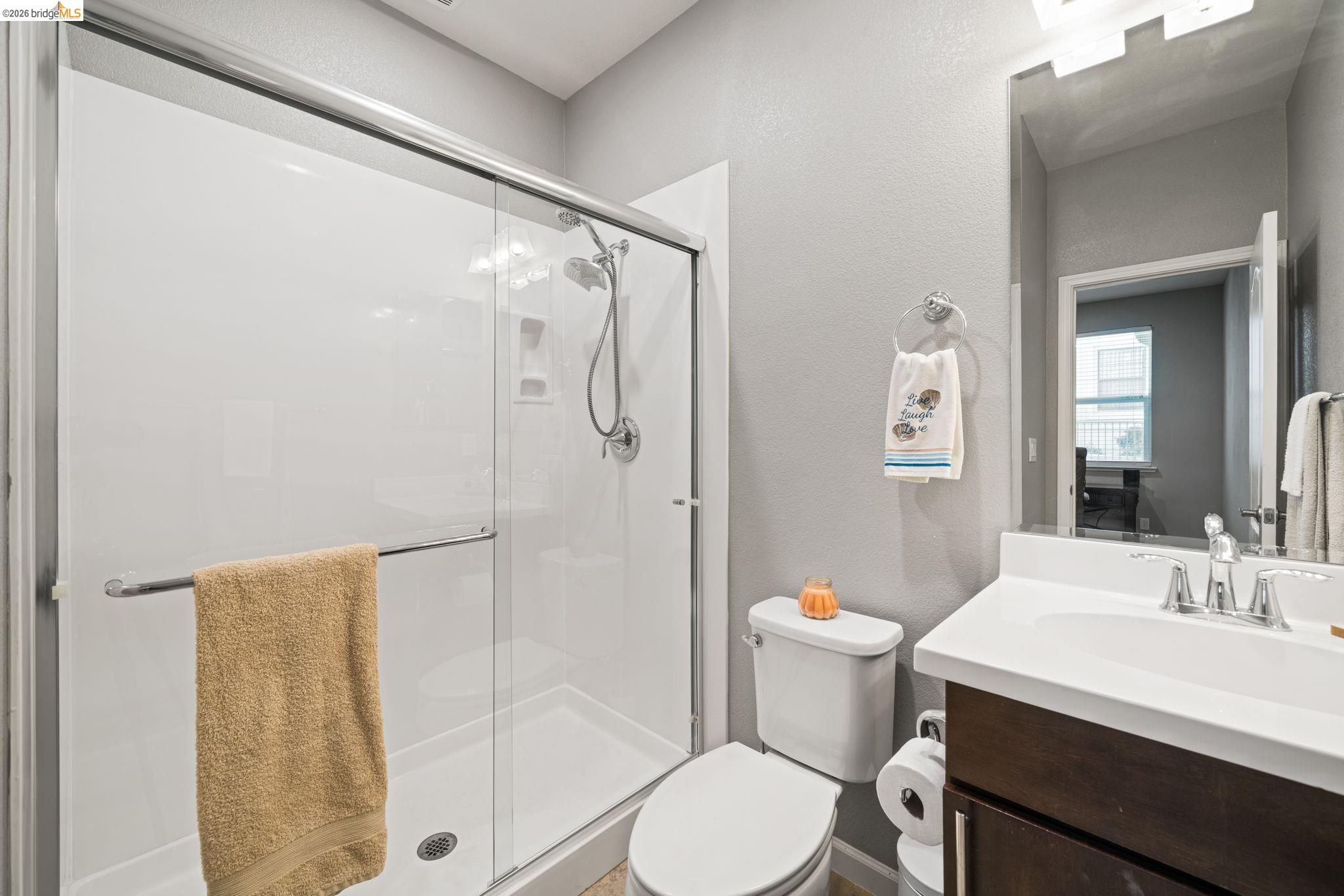 1280 Gusty Loop, Unit 4 Livermore, CA 94550 - Photo 24 of 40 a bathroom with a sink toilet and shower