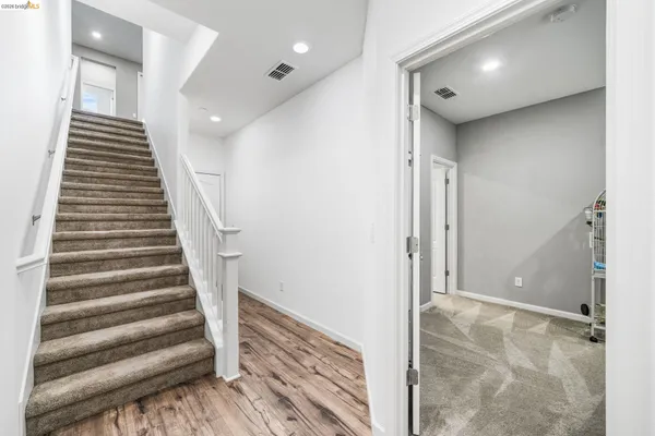 a view of entryway with stairs