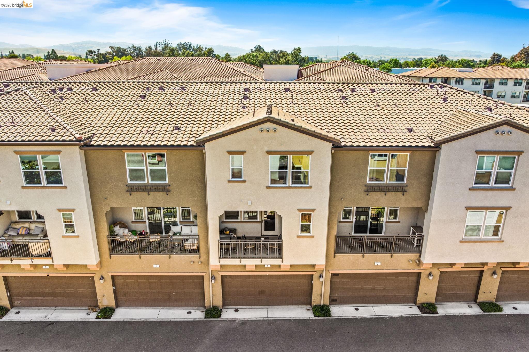 1280 Gusty Loop, Unit 4 Livermore, CA 94550 - Photo 32 of 40 a view of a house with a outdoor space
