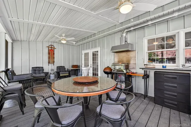 a dining room with furniture and window