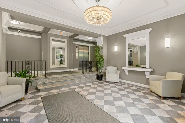 a view of a livingroom with furniture and windows