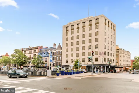 a view of a building with a garden