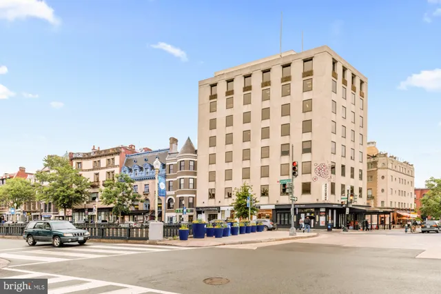 a view of a building with a garden