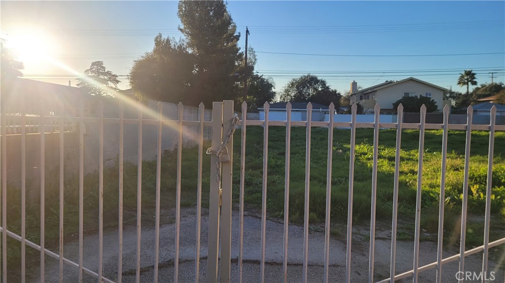 227 North Azusa Avenue Azusa, CA 91702 - Photo 4 of 7 a view of a building with wooden floor and fence