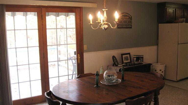 22 Stub Toe Road Cotuit, MA 02635 - Photo 9 of 16 a dining room with wooden floor