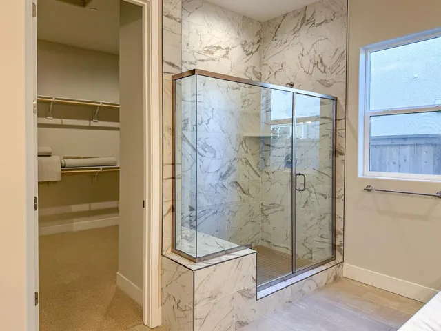 a bathroom with a sink and a shower