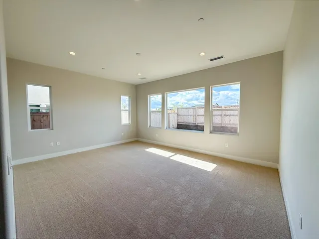a kitchen with stainless steel appliances granite countertop a sink and a microwave oven