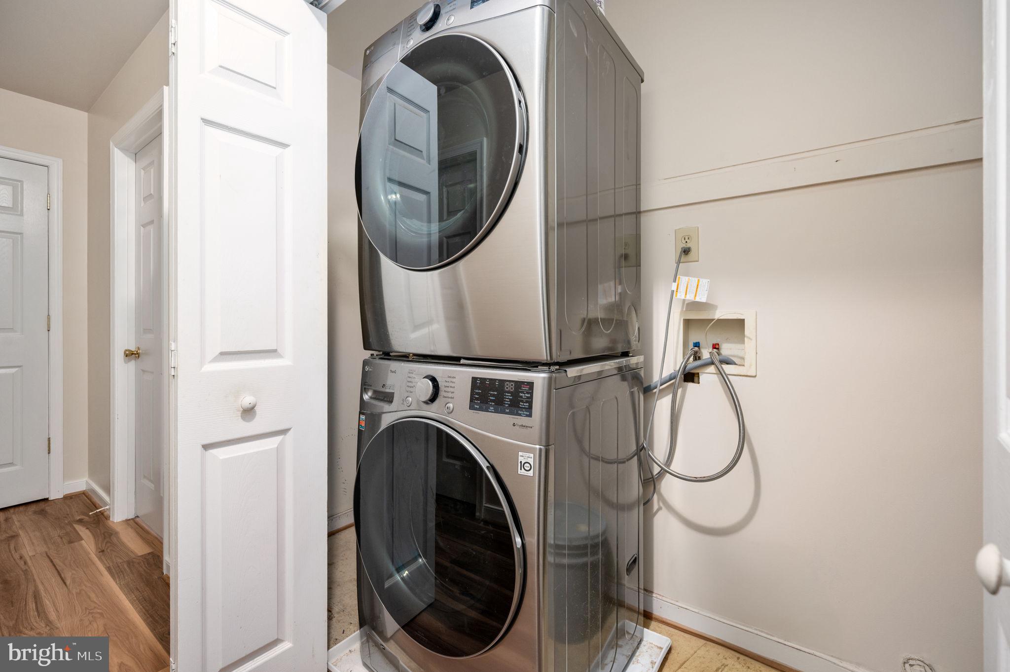 1822 Copper Line Road Bumpass, VA 23024 - Photo 28 of 65 a utility room with dryer and washer