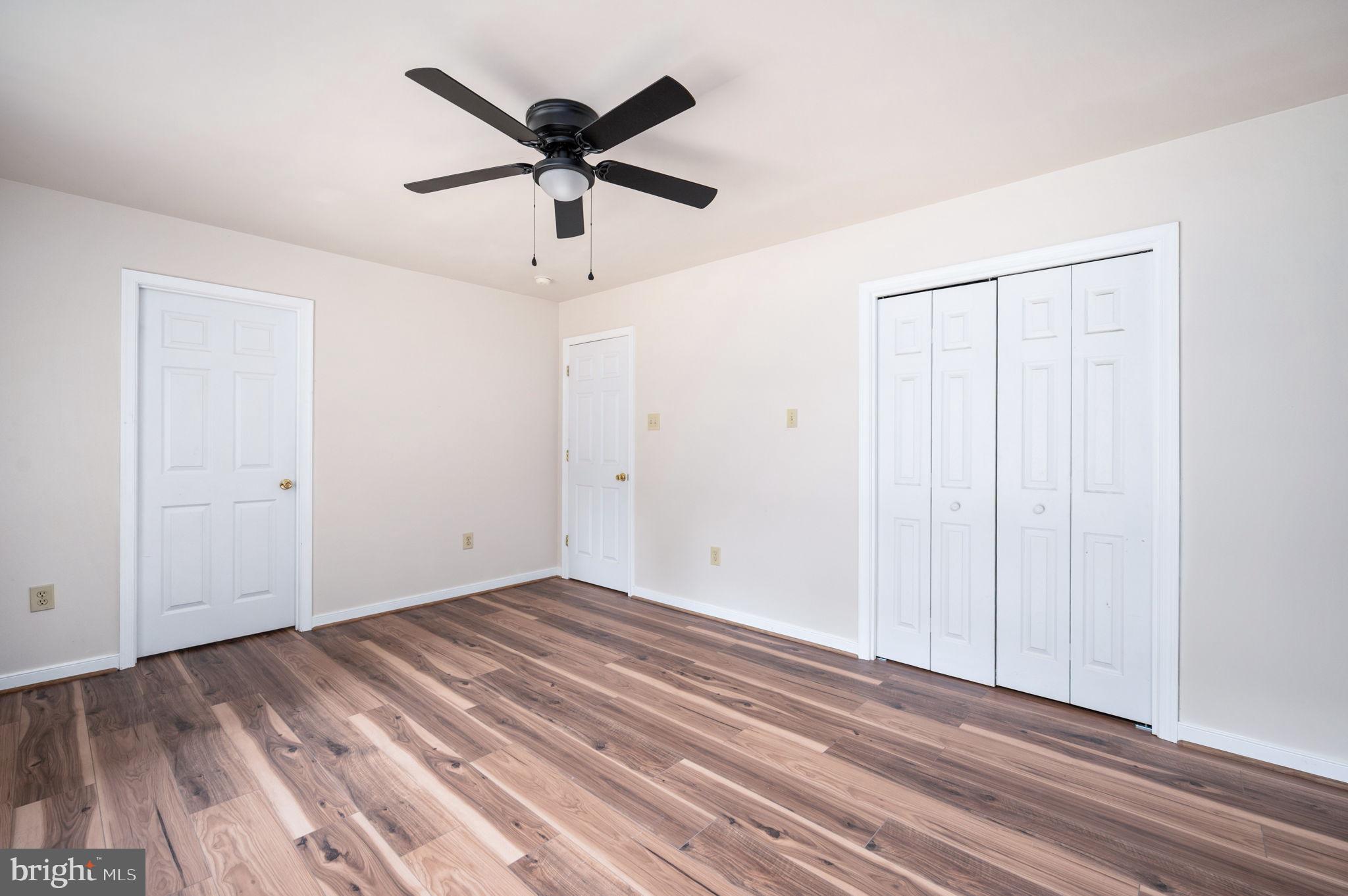 1822 Copper Line Road Bumpass, VA 23024 - Photo 36 of 65 wooden floor in an empty room