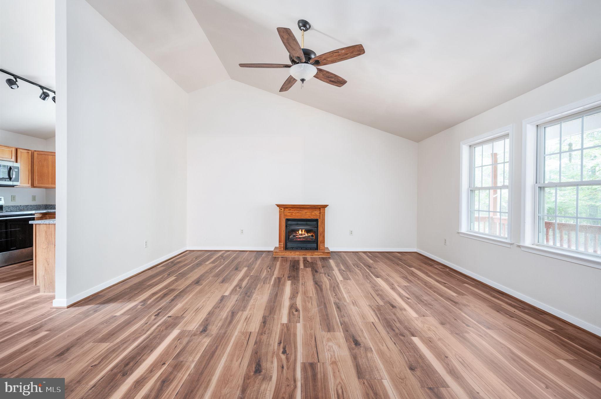 1822 Copper Line Road Bumpass, VA 23024 - Photo 10 of 65 wooden floor in a room next to a window