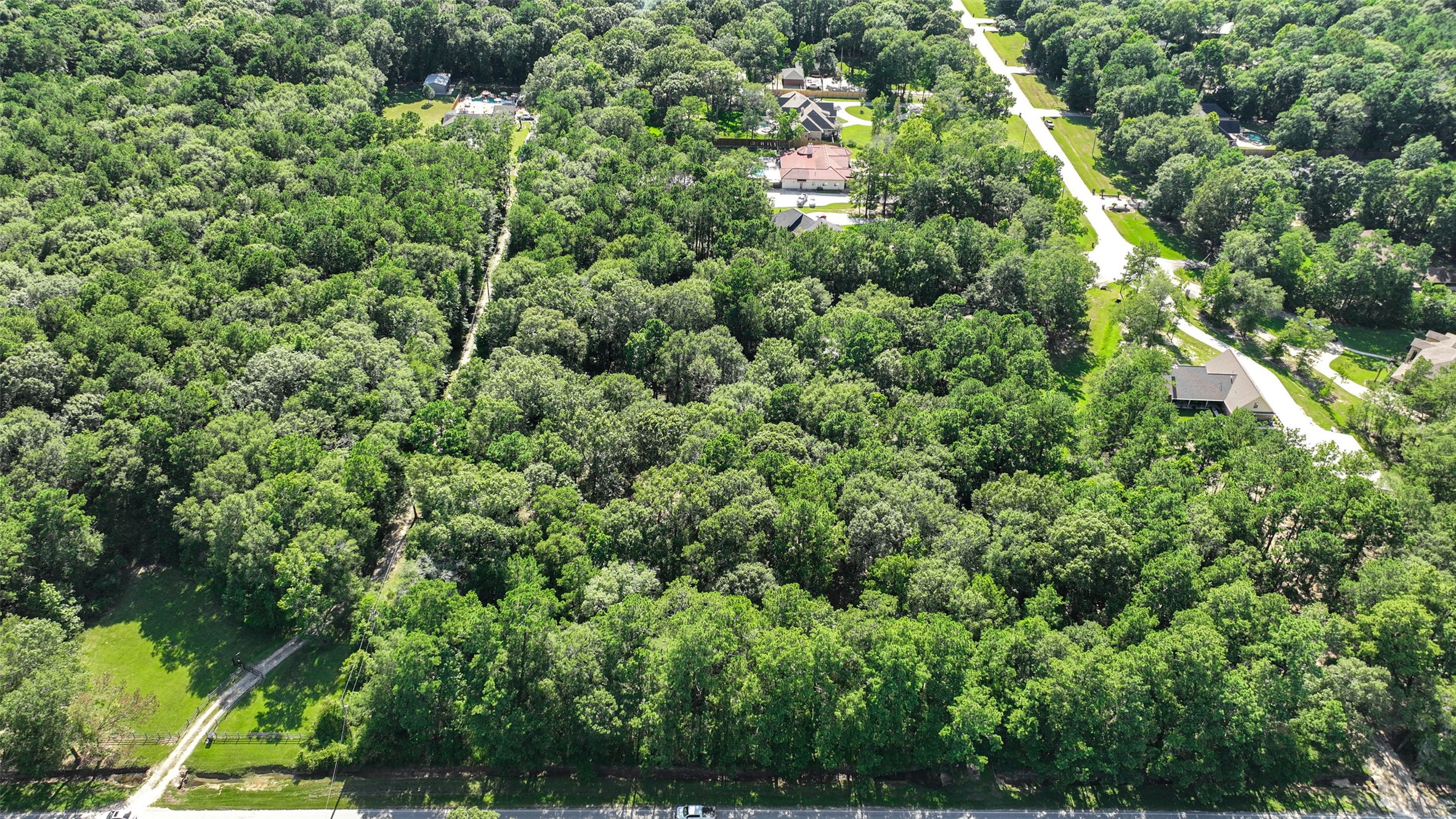29811 Huffman Cleveland Road Huffman, TX 77336 - Photo 15 of 20 an aerial view of a house with a yard