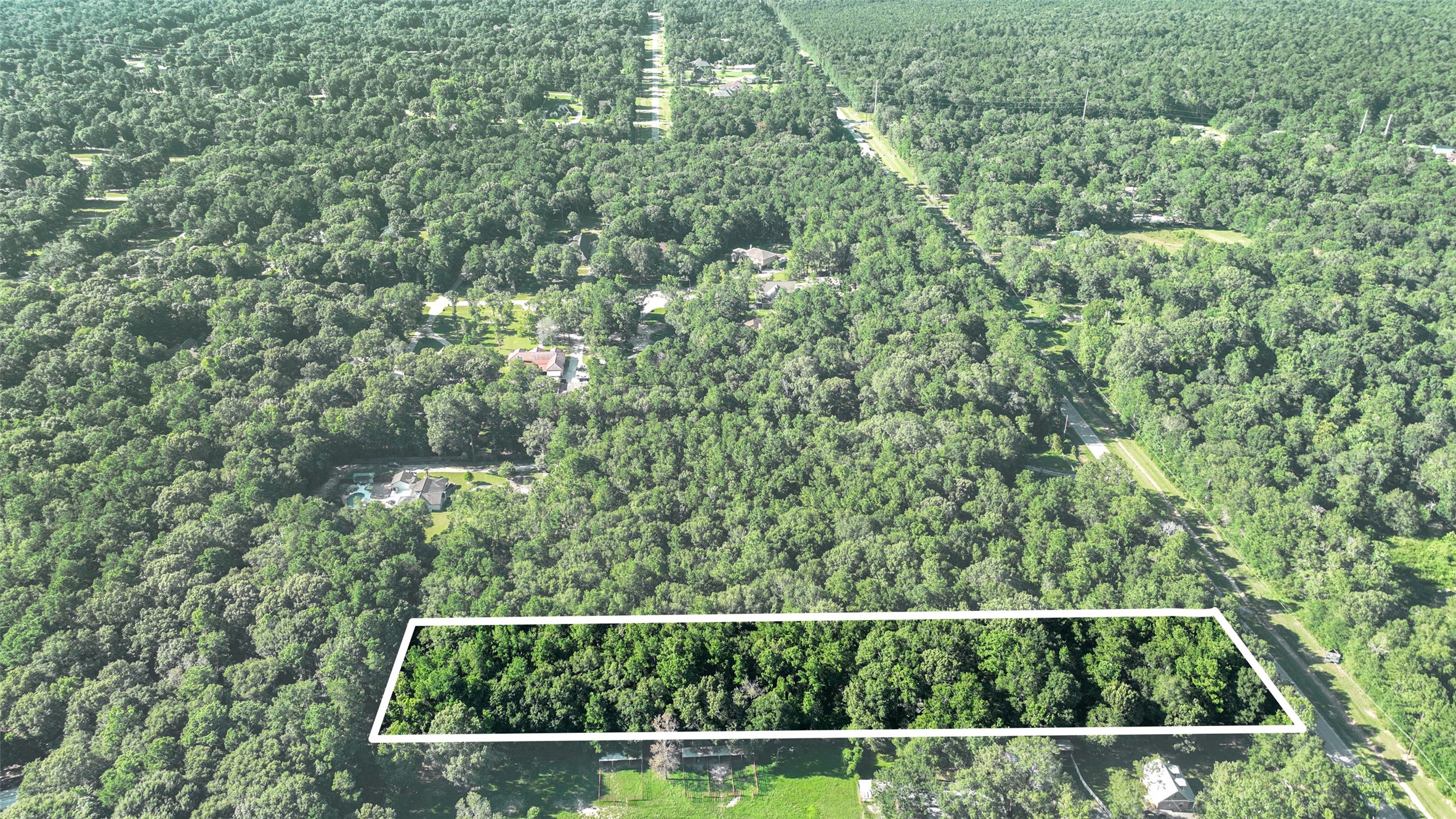 29811 Huffman Cleveland Road Huffman, TX 77336 - Photo 4 of 20 a view of an outdoor space with a street view