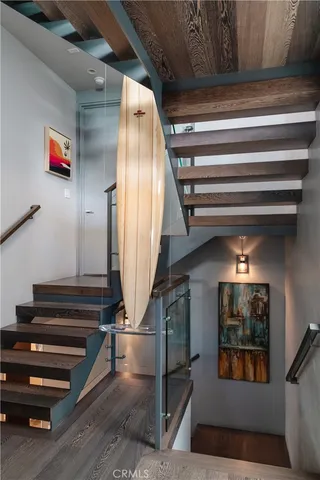 a bathroom with a sink a toilet and a shower