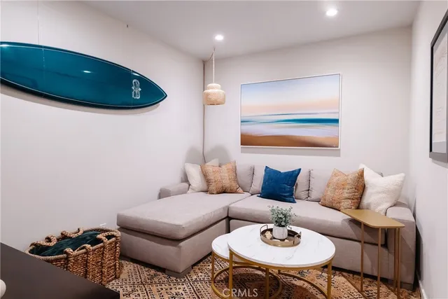 a bedroom with a large bed and furniture