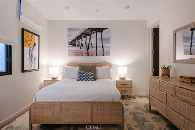 a bathroom with a toilet a sink and a mirror