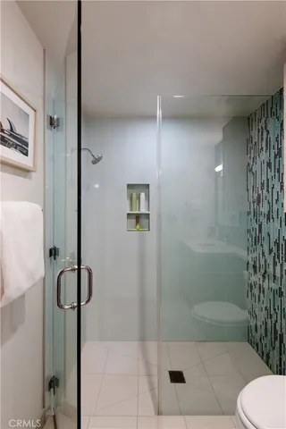 a kitchen with a sink cabinets and a window