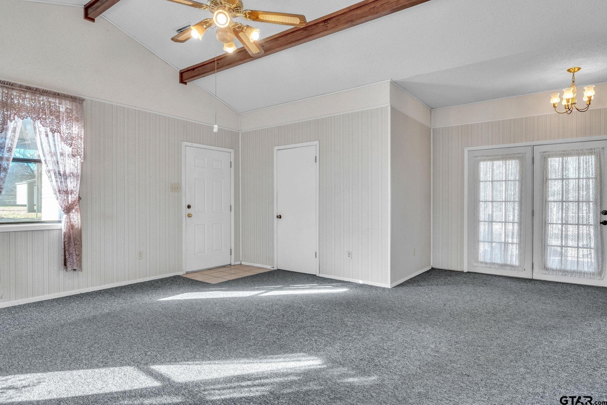 501 Samuel Street Marshall, TX 75672 - Photo 17 of 41 a view of an empty room with a window