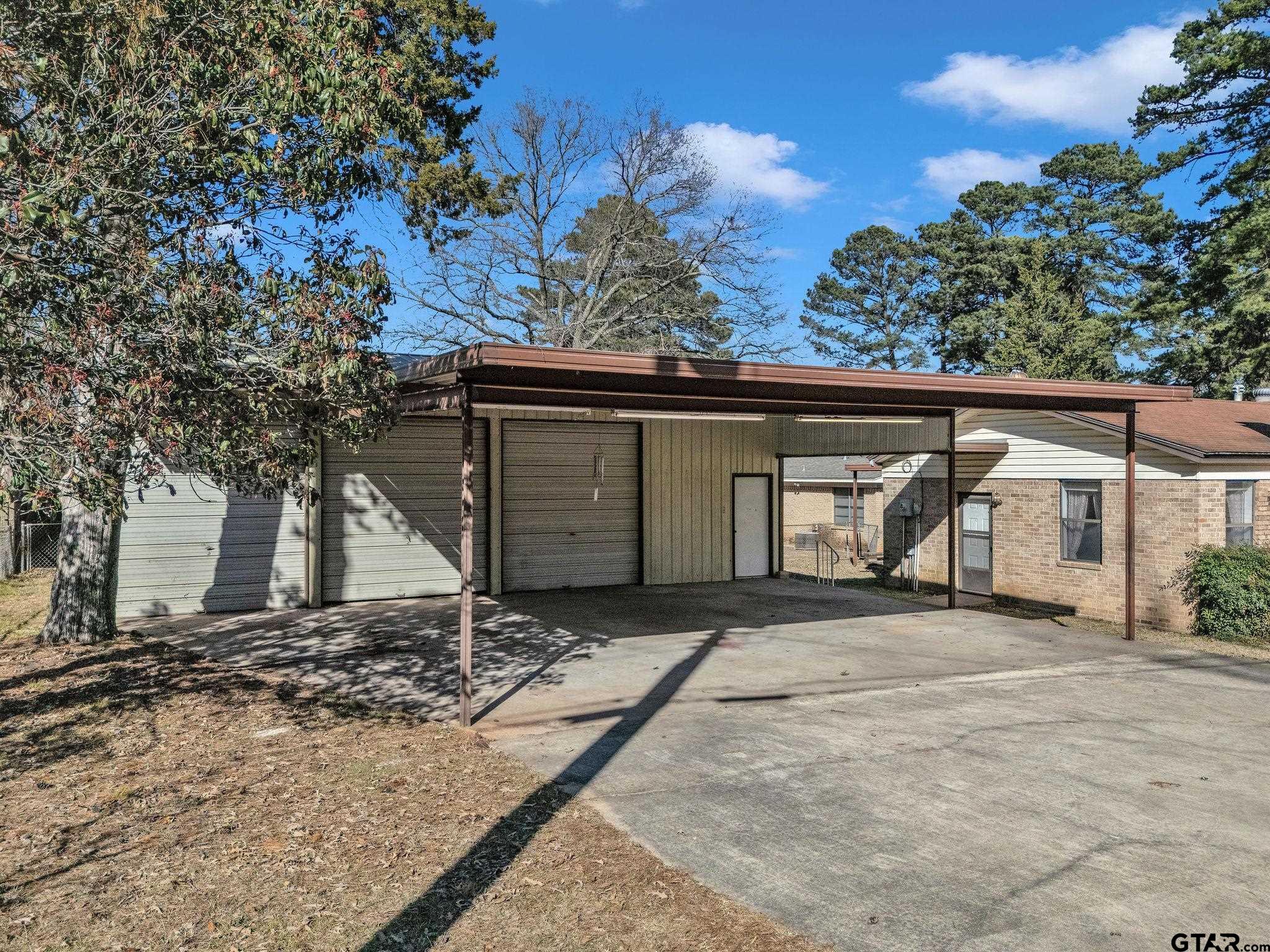 501 Samuel Street Marshall, TX 75672 - Photo 29 of 41 a view of a house with a tree