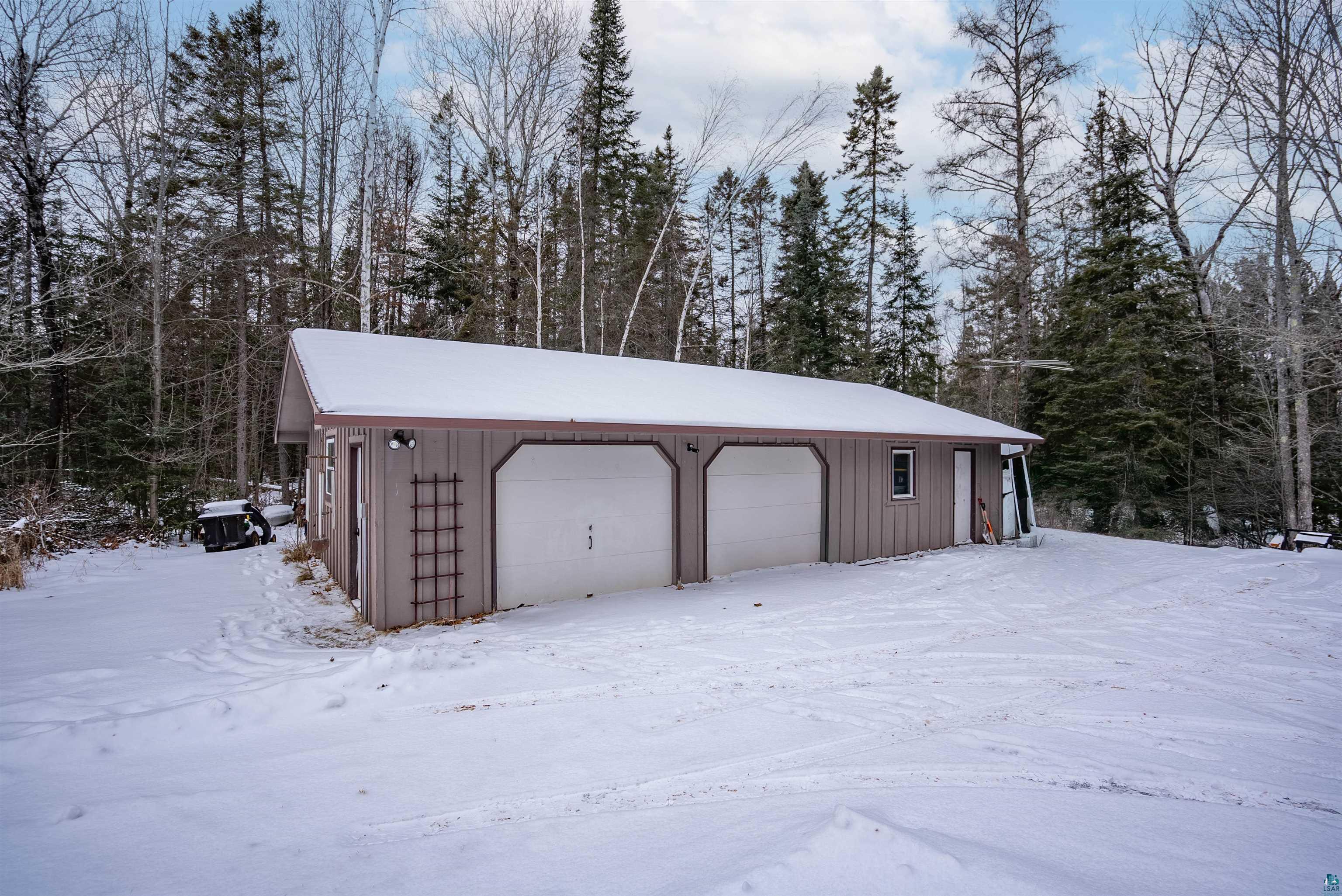 6949 County Rd A Superior, WI 54880 - Photo 25 of 34 View of snow covered garage