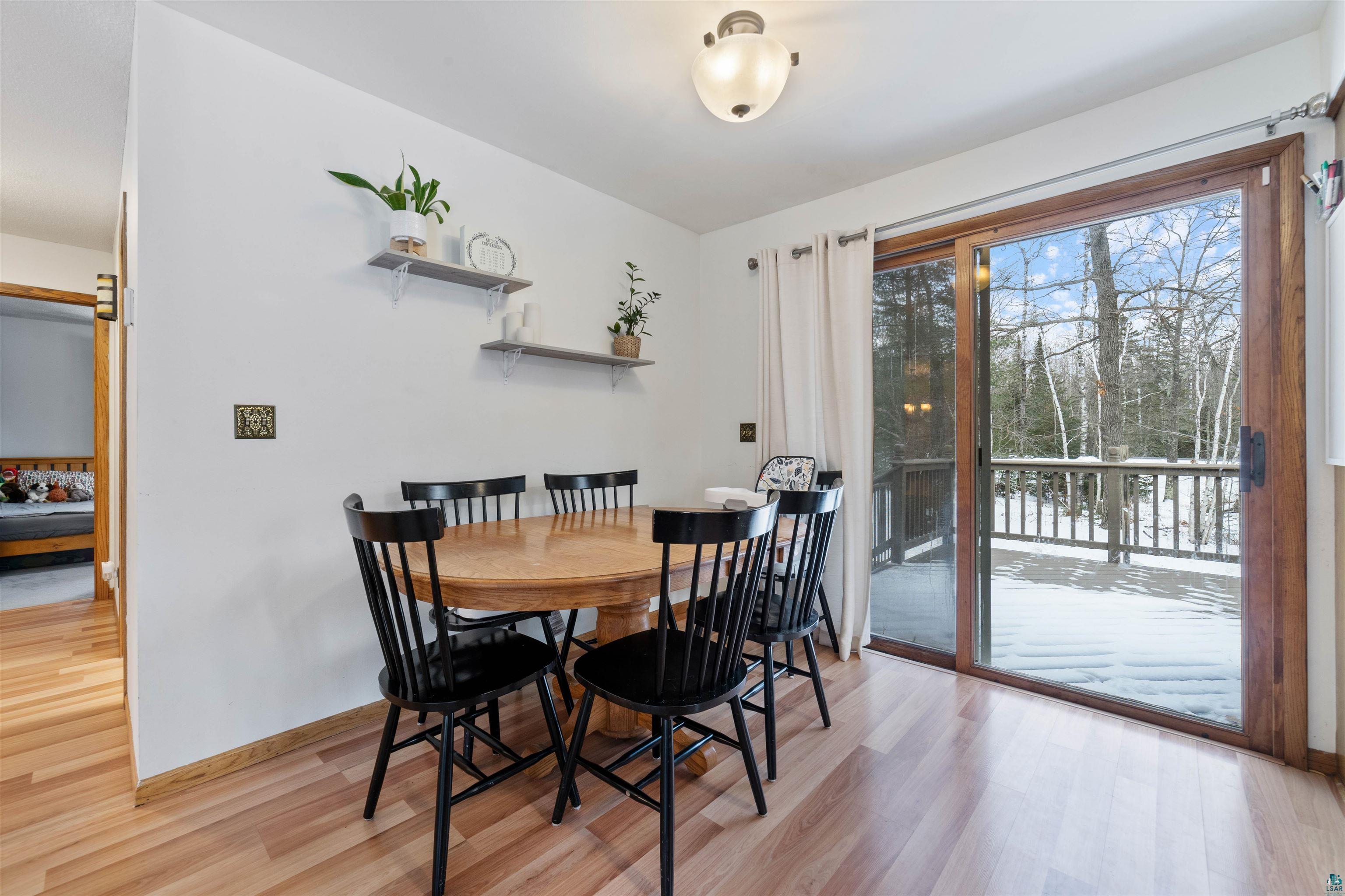 6949 County Rd A Superior, WI 54880 - Photo 9 of 34 Dining area with light hardwood / wood-style floors