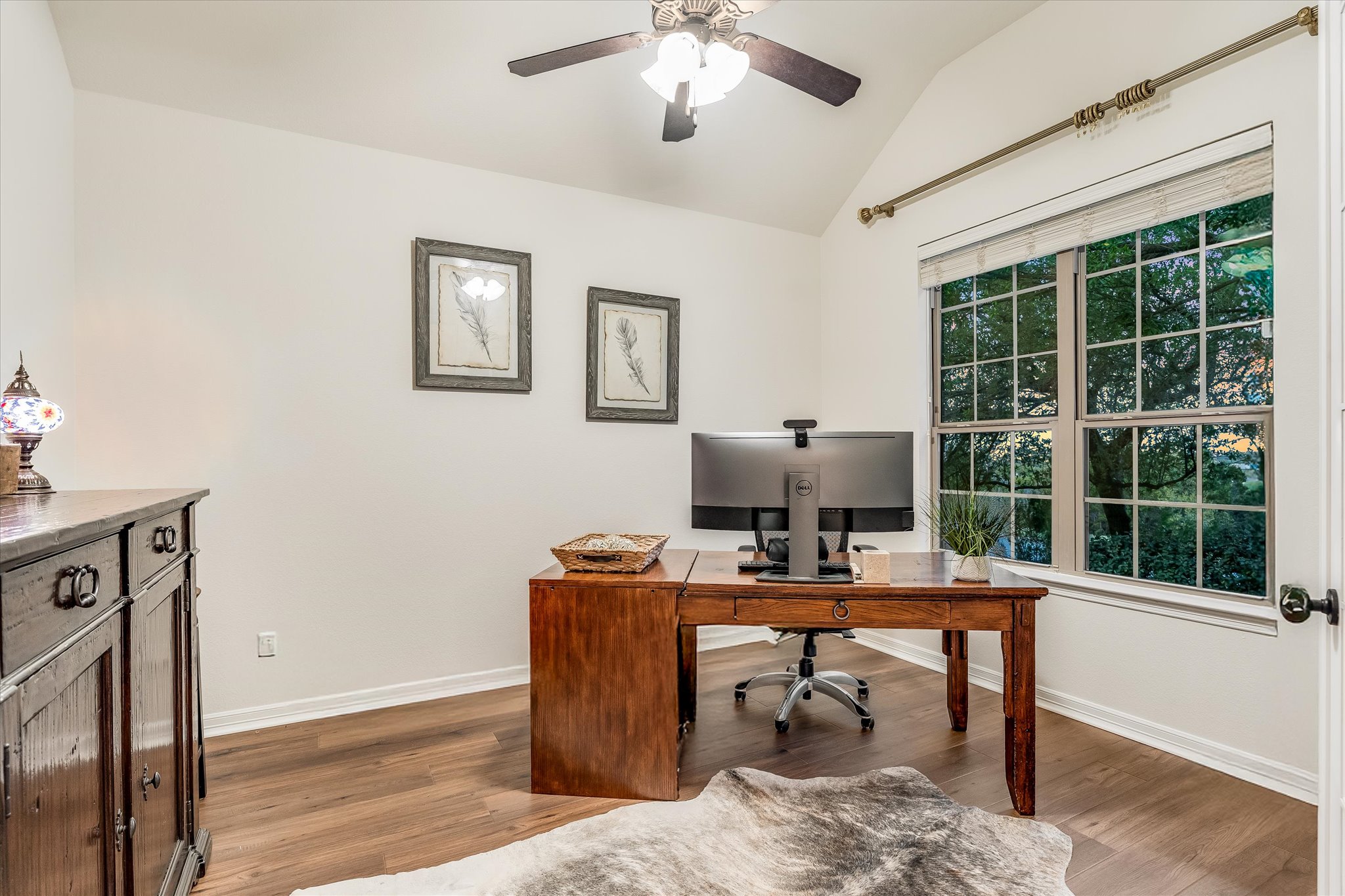 226 Galloway Lane Austin, TX 78737 - Photo 7 of 30 Office area featuring lofted ceiling, dark wood-style floors, and ceiling fan