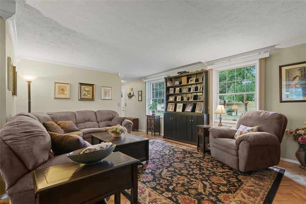 274 Kettering Circle Gibsonia, PA 15044 - Photo 12 of 50 a living room with furniture and a window
