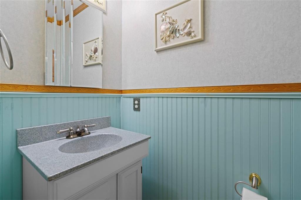 274 Kettering Circle Gibsonia, PA 15044 - Photo 18 of 50 a bathroom with a sink and a mirror