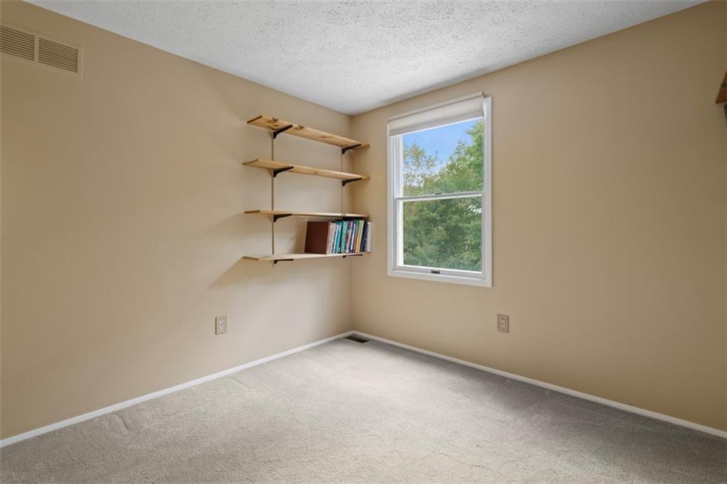 274 Kettering Circle Gibsonia, PA 15044 - Photo 31 of 50 a view of a room that has a window and cabinets