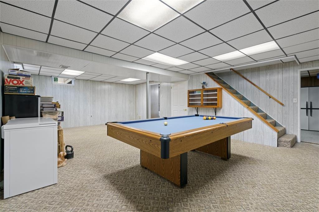 274 Kettering Circle Gibsonia, PA 15044 - Photo 37 of 50 a room with furniture and a flat screen tv