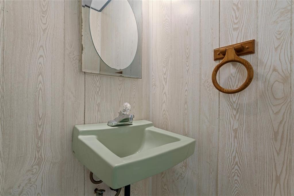 274 Kettering Circle Gibsonia, PA 15044 - Photo 38 of 50 a bathroom with a sink a toilet and a mirror