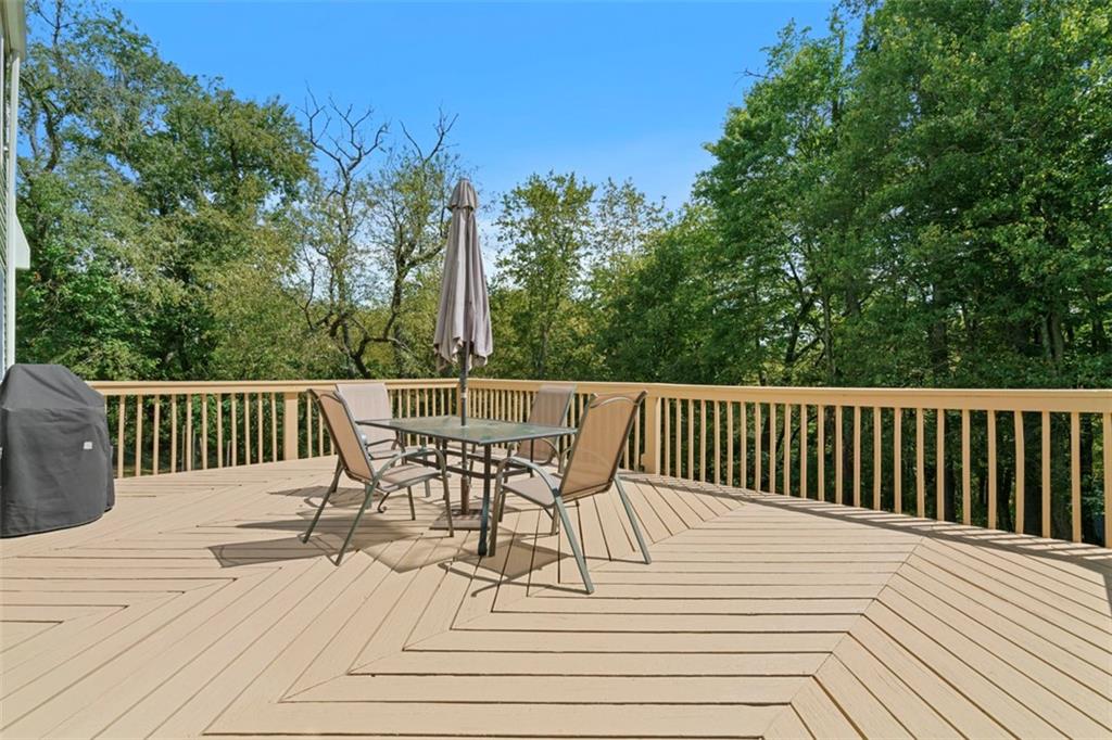 274 Kettering Circle Gibsonia, PA 15044 - Photo 42 of 50 a view of a chair and table on the wooden floor