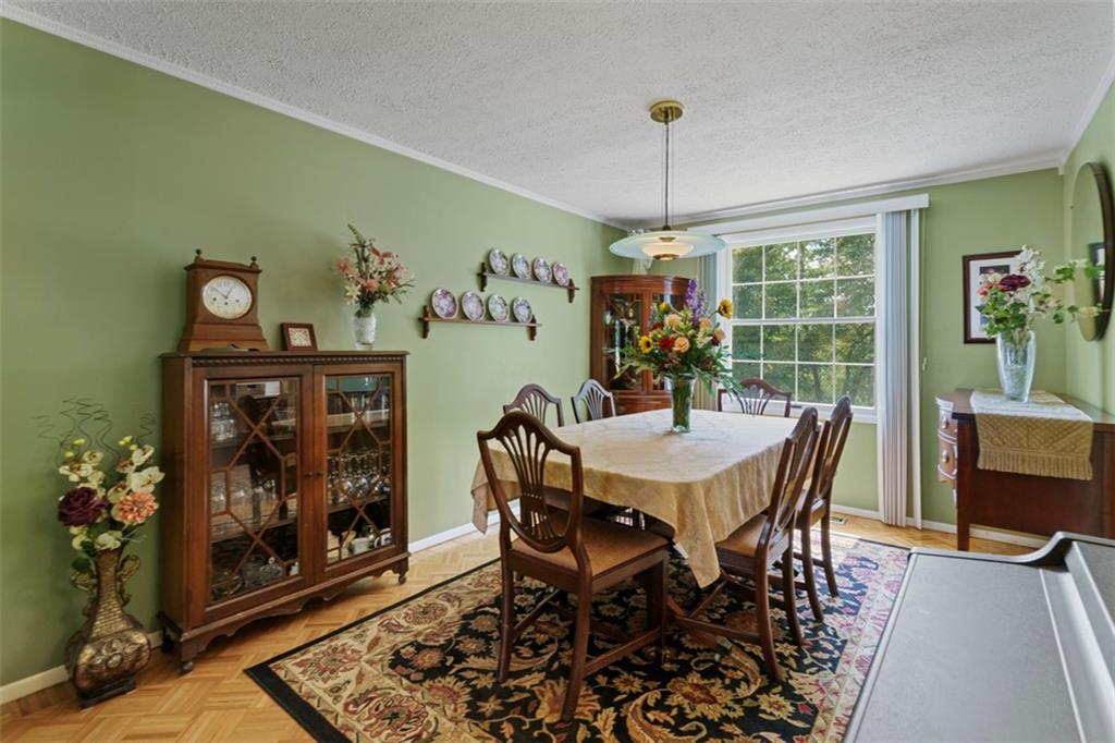 274 Kettering Circle Gibsonia, PA 15044 - Photo 10 of 50 a view of a dining room with furniture window and outside view