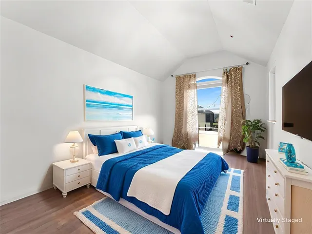 a view of a livingroom with furniture and a chandelier