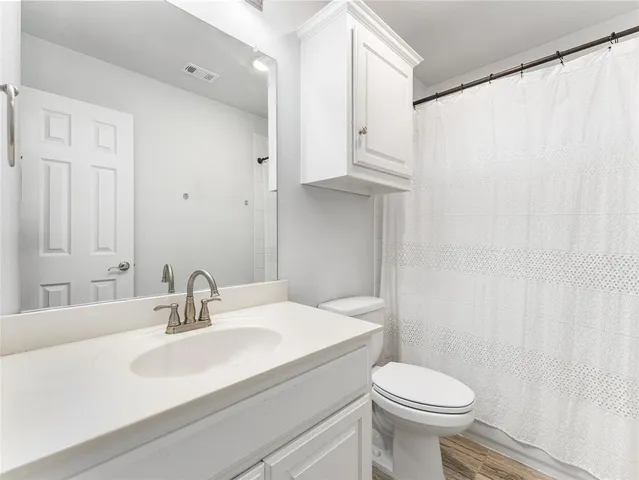 a bedroom with a bed and tv