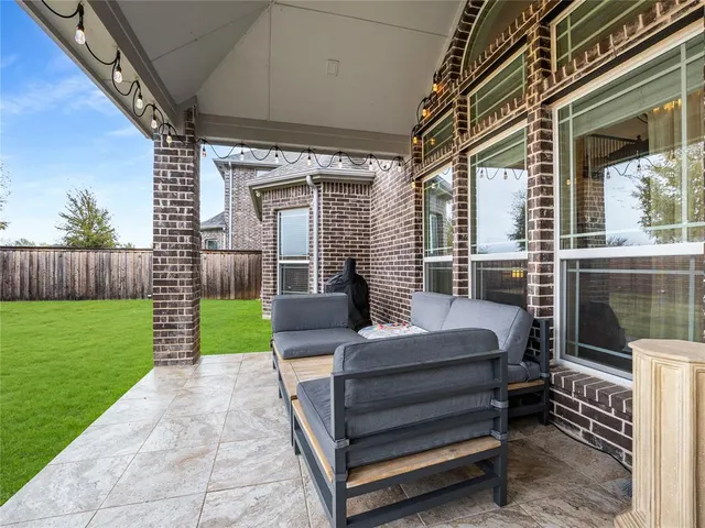 a living room with a flat screen tv