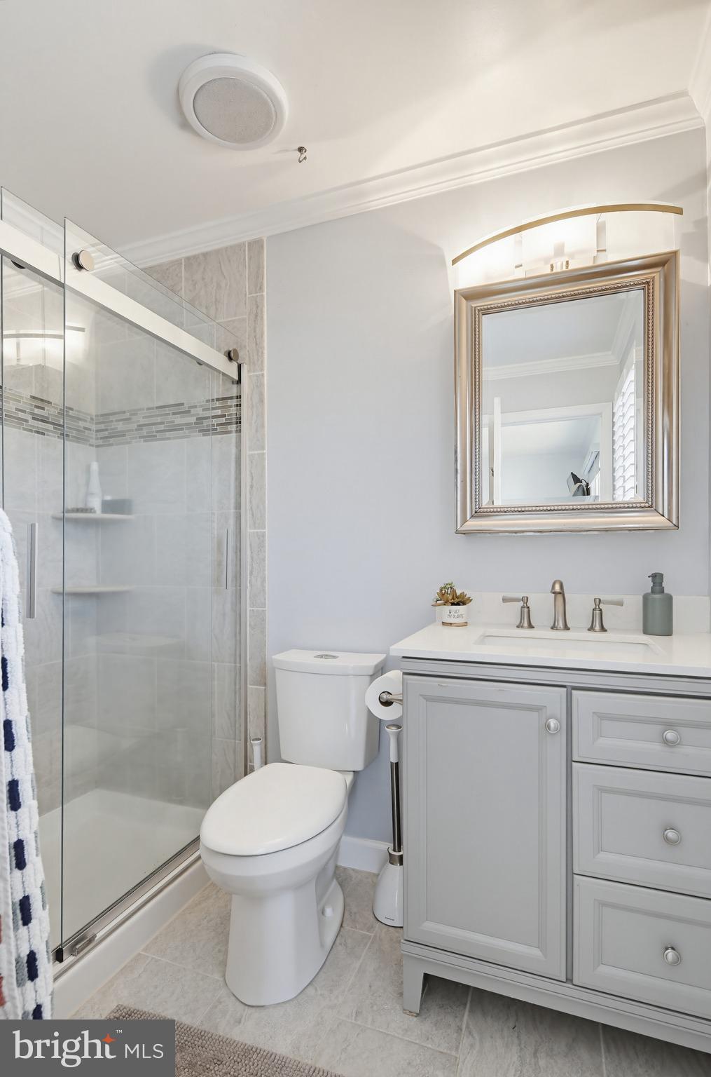 3229 Beards Point Road Davidsonville, MD 21035 - Photo 54 of 69 a bathroom with a toilet a sink and shower