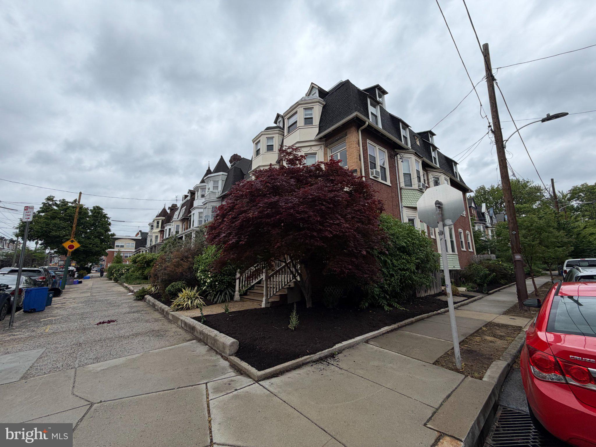 815 South 49th Street Philadelphia, PA 19143 - Photo 63 of 72 Charming corner property with lush greenery.