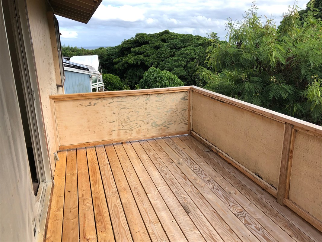 5309 Kihei Road Kapaa, HI 96746 - Photo 12 of 20 a view of balcony with wooden floor and fence